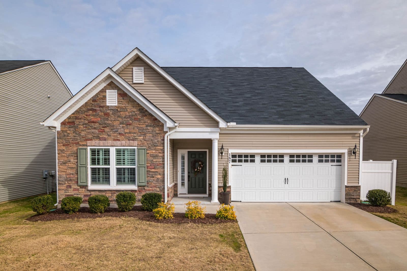 Single-level home with stone accents, typical of Falls Church's mid-century neighborhoods